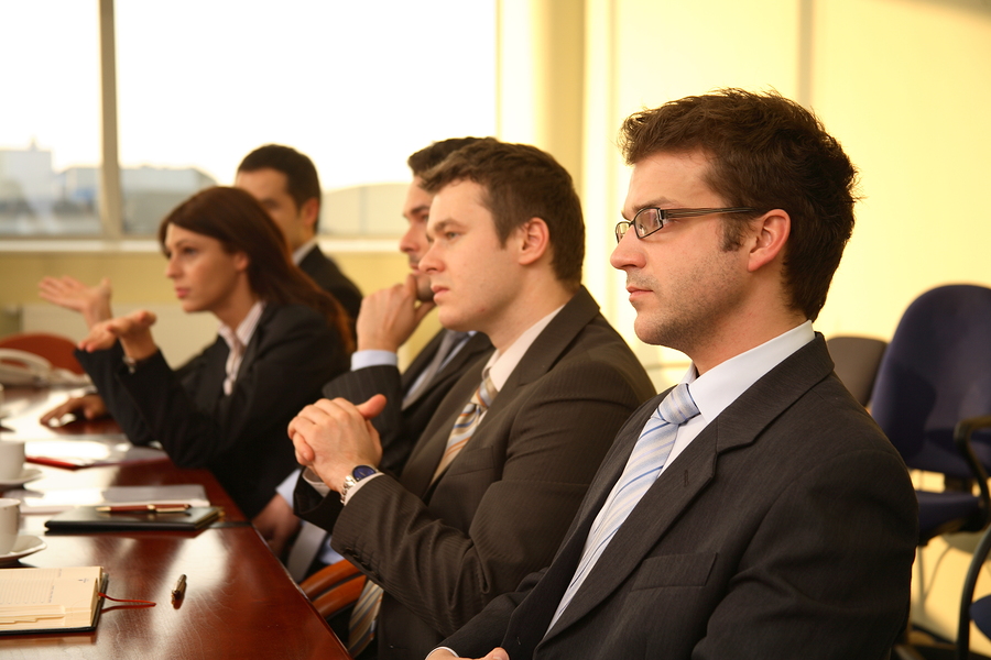 Five Business Persons At A Conference,Interview